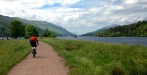 Riding a mountain bike on the Great Glen Way between Inverness and Fort William, Scotland UK