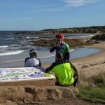 Cyclists relaxing with refreshments on Moray Coastal Trail Scotland